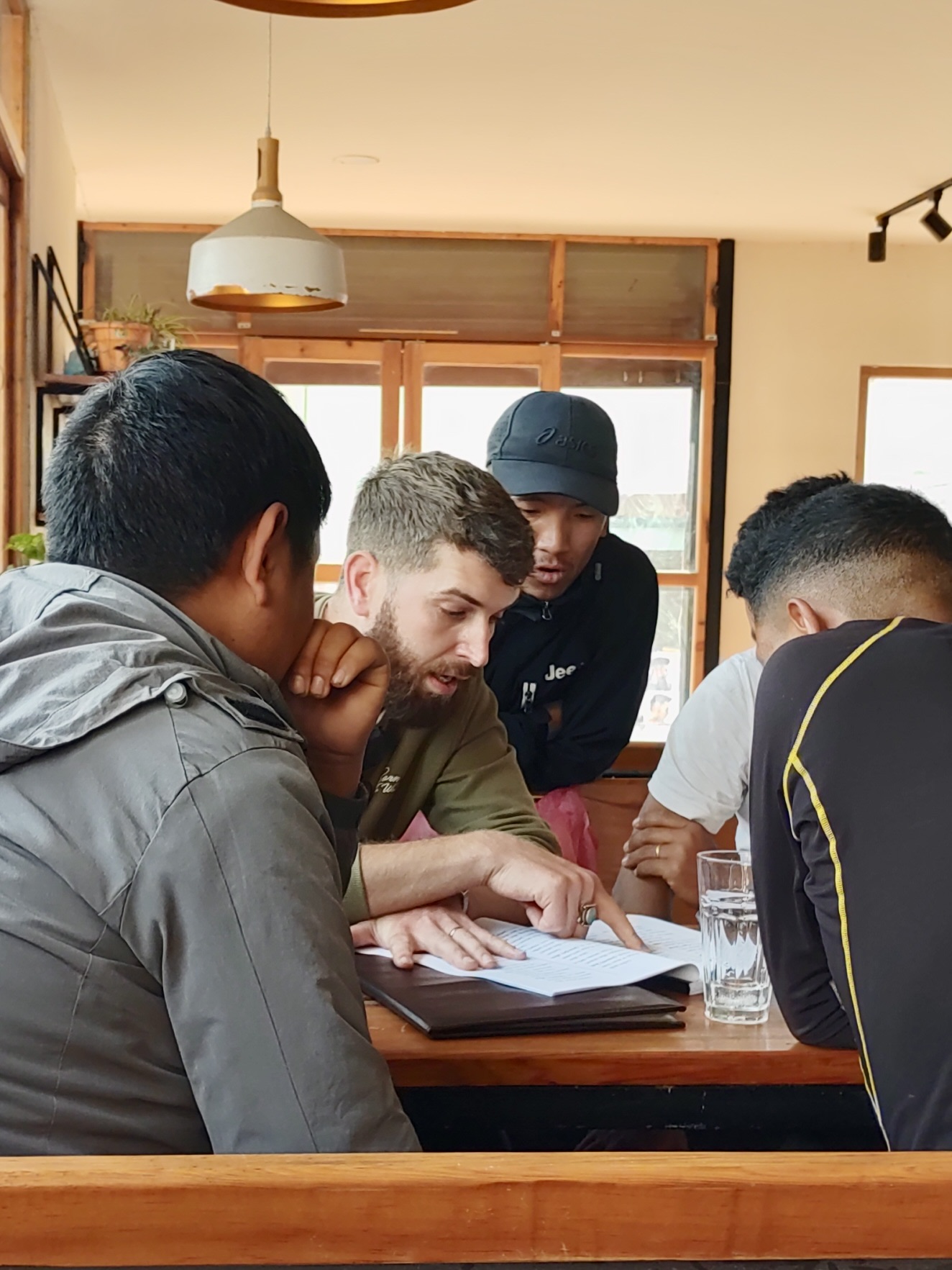 Mark with a group of people.