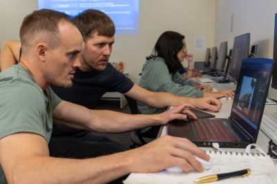 Students work on ceramics art projects