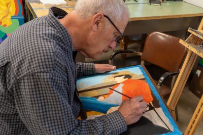 Students work on painting art projects