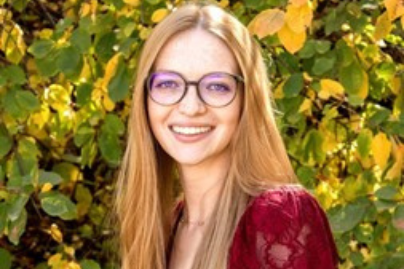 Smiling woman with glasses