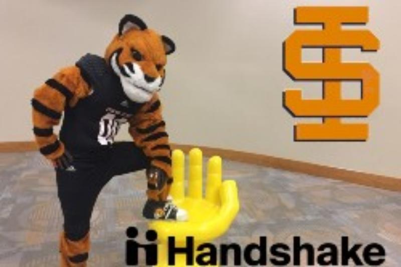 Benny Bengal with Handshake and ISU logos