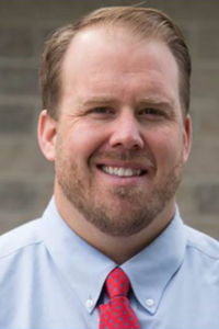 Headshot of Greg Larson