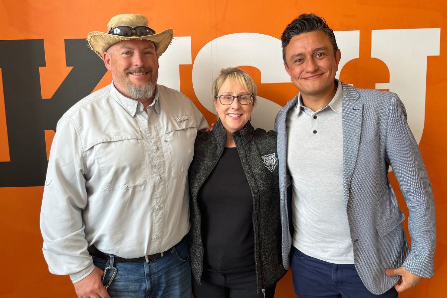 Carr, Turley Ames, and Villalobos Graillet pose together with smiles on their faces