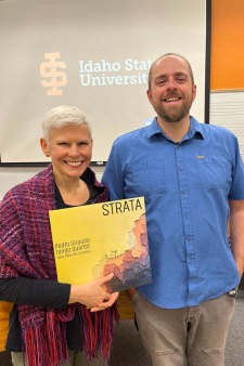 Nell and Jon hold strata album