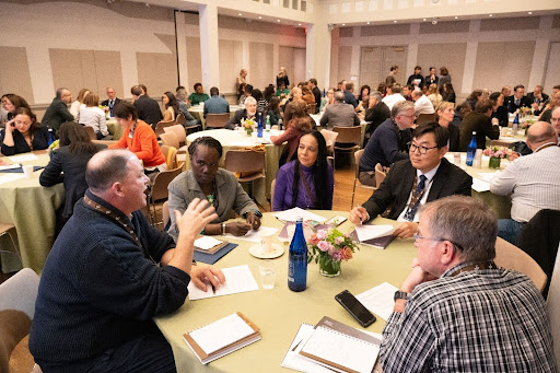 Dr. Shin Kue Ryu in a group workshop discussing pedagogy and curriculum innovations