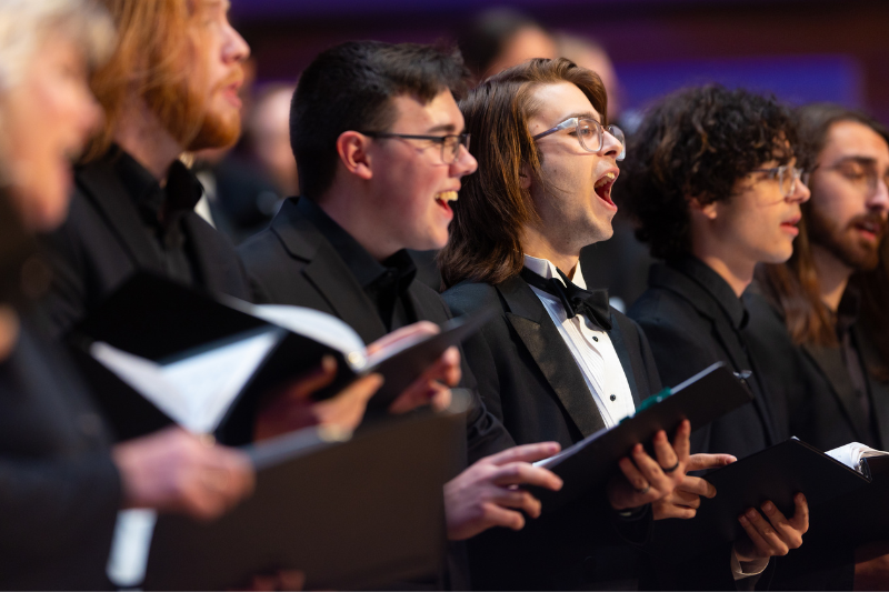 choral students sing onstage