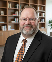 Headshot of John Curry