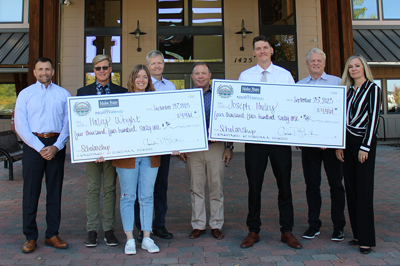 Employees of North Wind and ISU's College of Science and Engineering pose for a photo with the 2023 North Wind scholarship winners.
