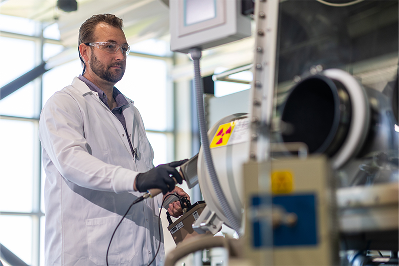 A student using a Geiger counter