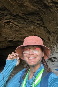Daliedmarie takes a selfie in front of a cave entrance