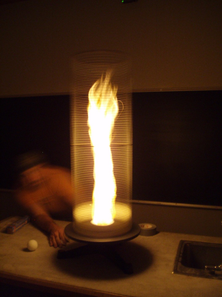 A fire tornado in a cylindrical cage