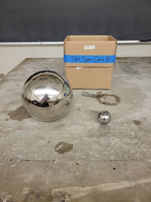 2 steel balls of different sizes