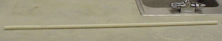 A pvc pipe with concrete in one end to off set the center of gravity