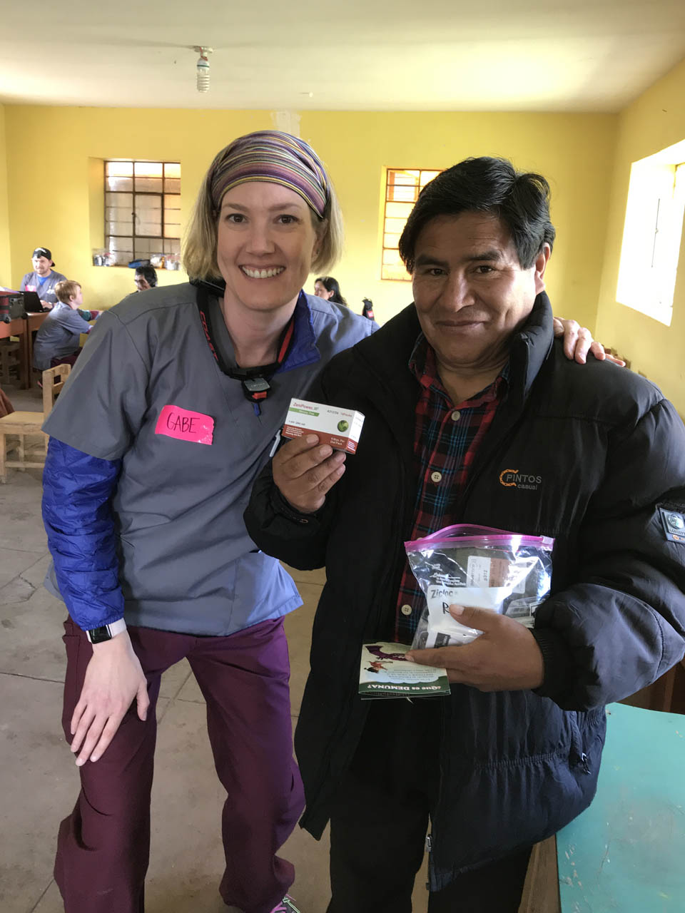 Patient receives his new hearing aid from ISU Audiology Faculty