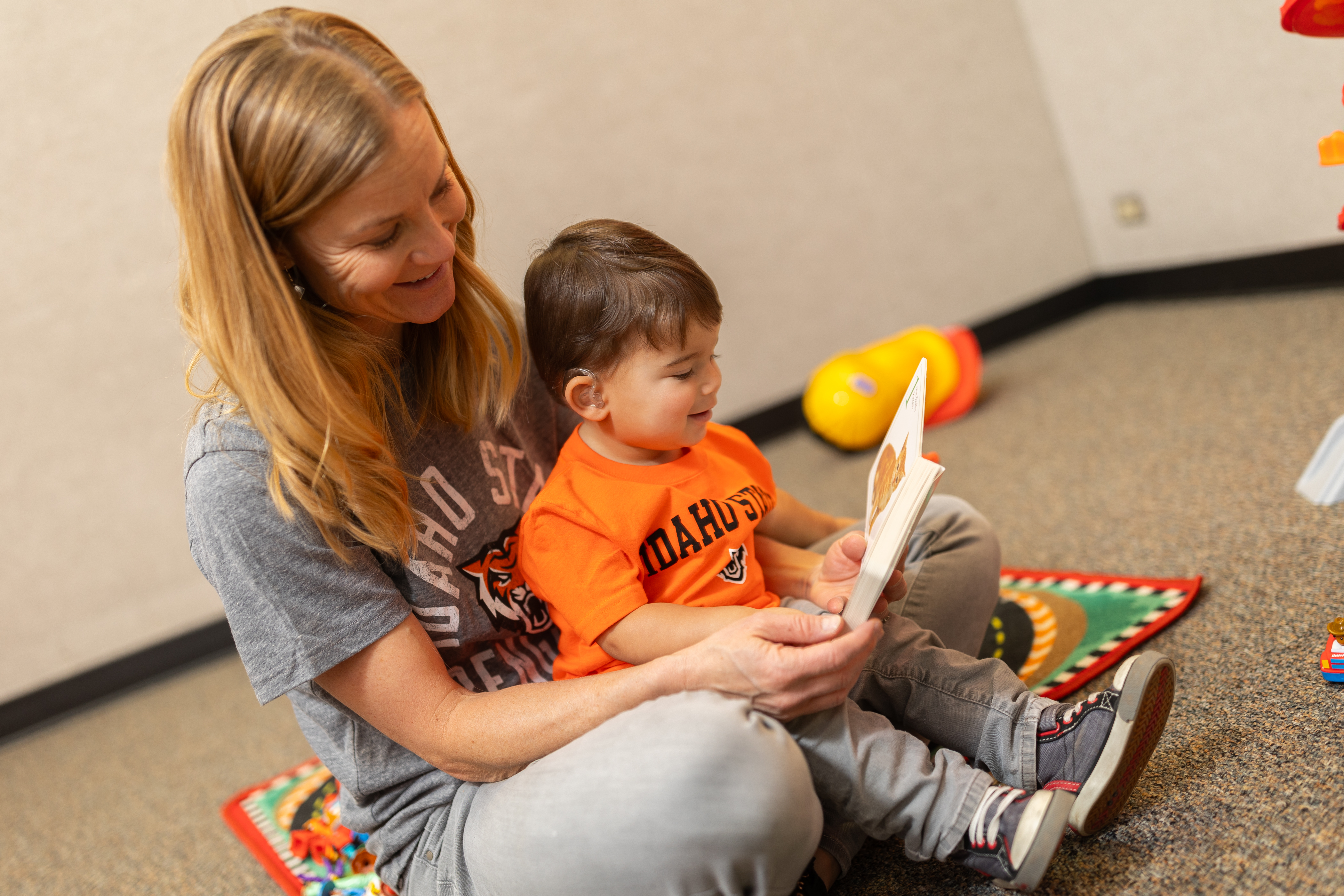 Woman reading to a child