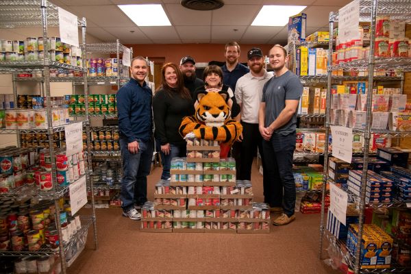 Benny Bengal and community members gathered in benny's pantry