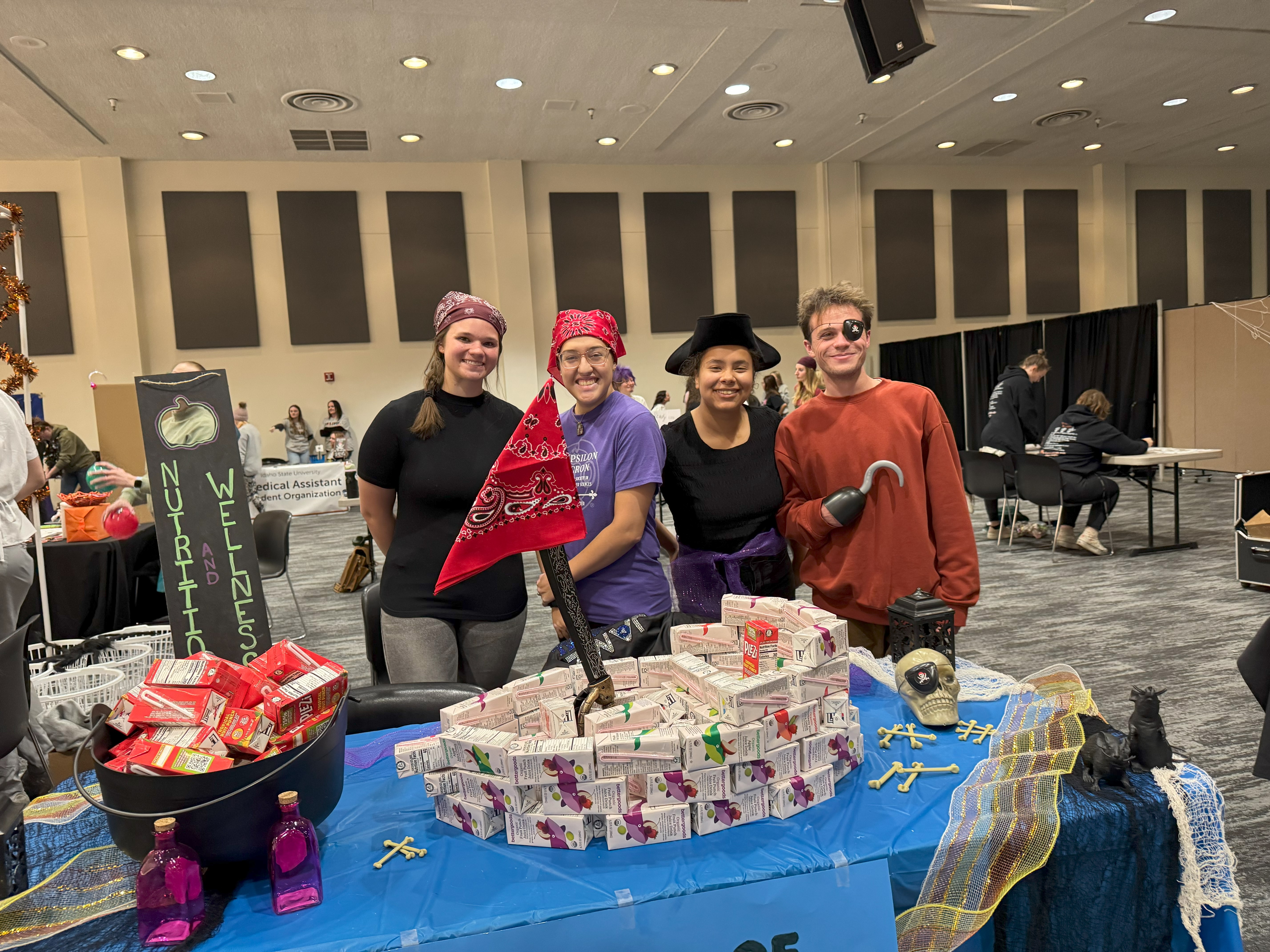 students in the nutrition and wellness club dressed up for halloween at an ISU event