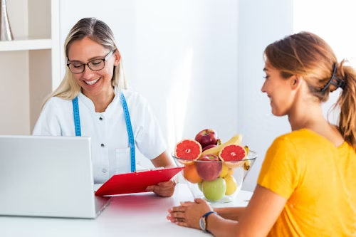 A dietitian is counseling a client