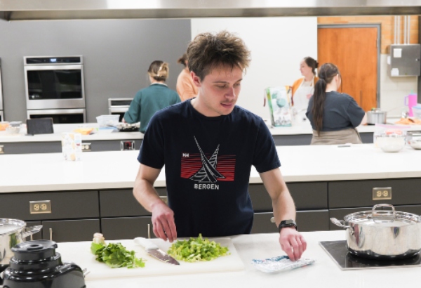 Dietetics students cooking in ISU foods laboratory