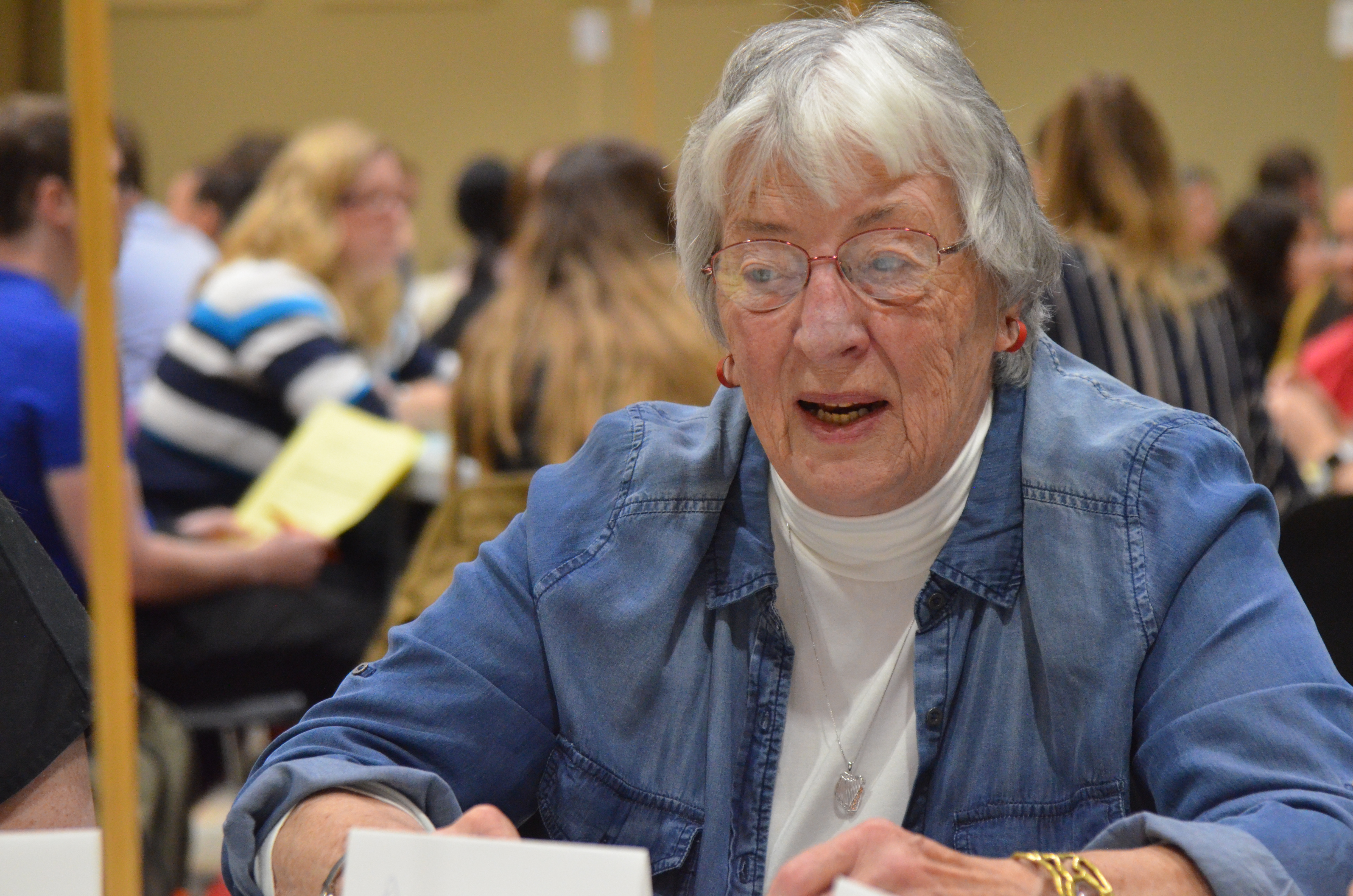 An older adult participates in the IPE event at ISU