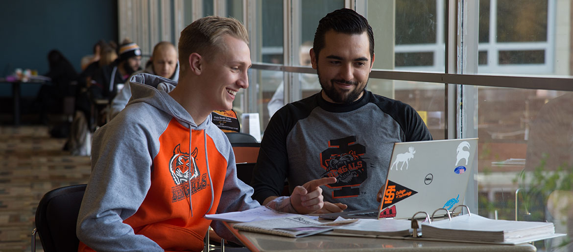 eISU Student sitting at a computer