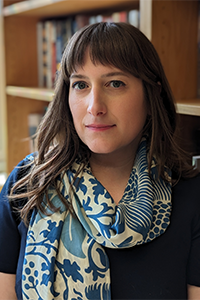 Portrait of Dr. Marie Stango wearing decorative neck scarf