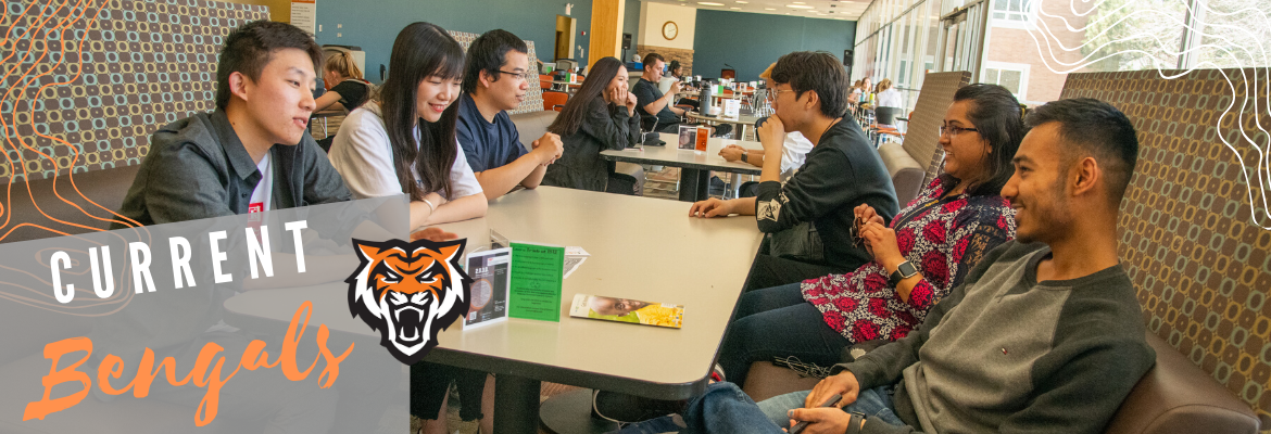 Students around a table.