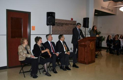 Speakers addressing audience