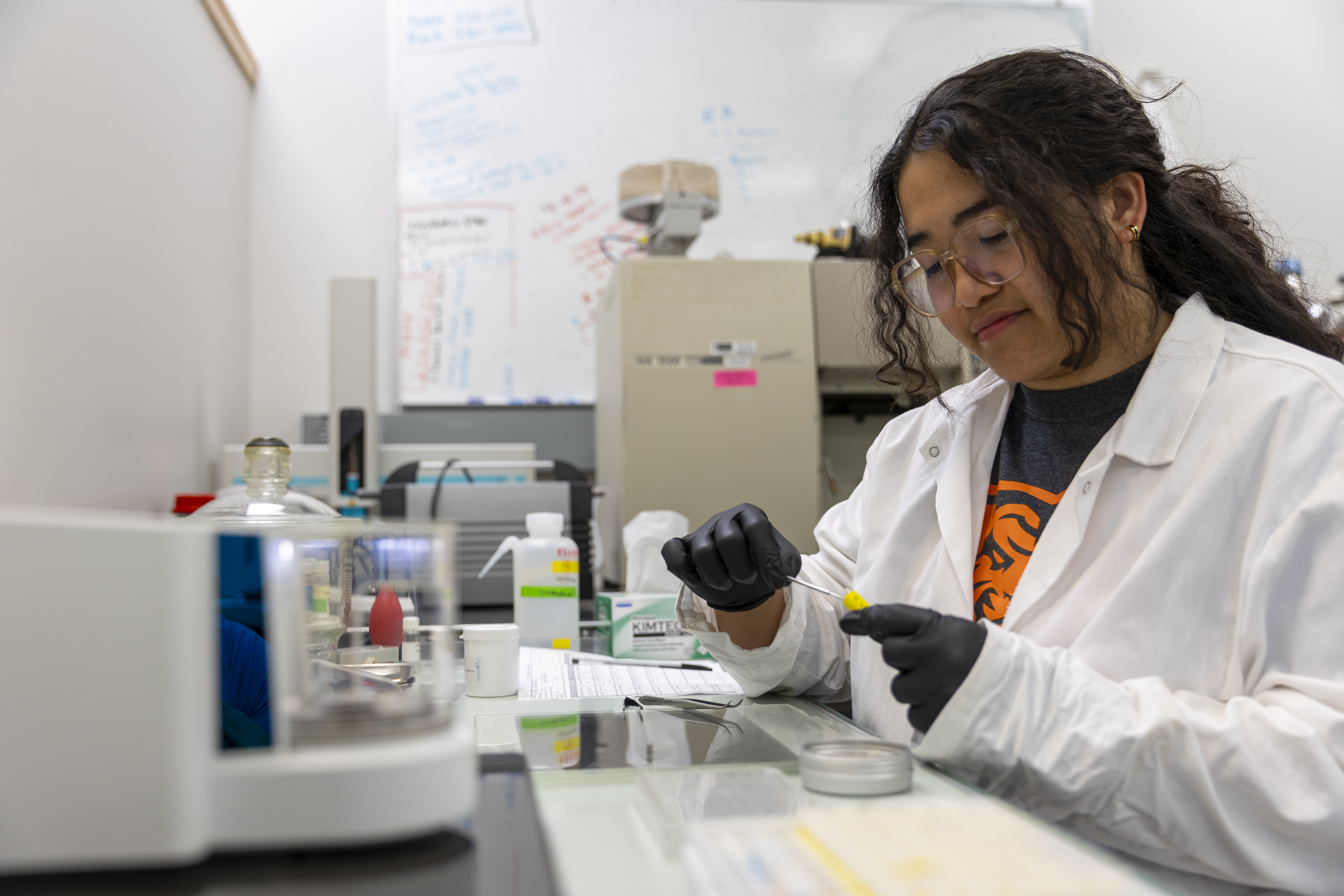 Haskell Distajo, graduate student, poses for photos in the Stable Isotope Laboratory on Idaho State University’s Pocatello campus.