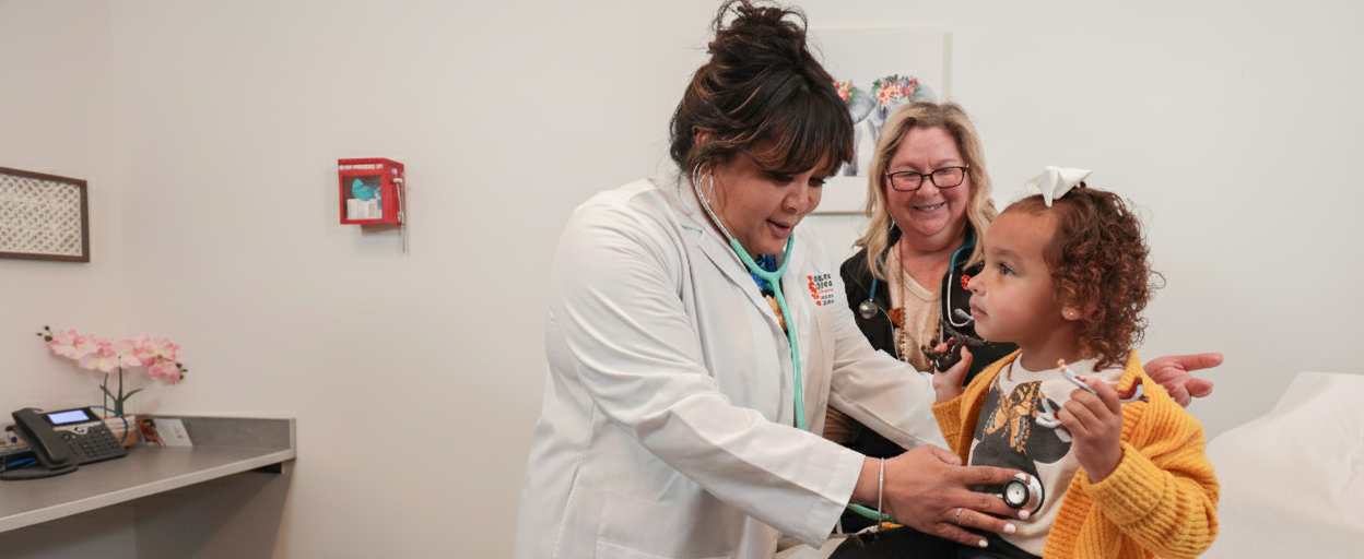 Dr. Michelle Anderson and a young patient in the meridian clinic