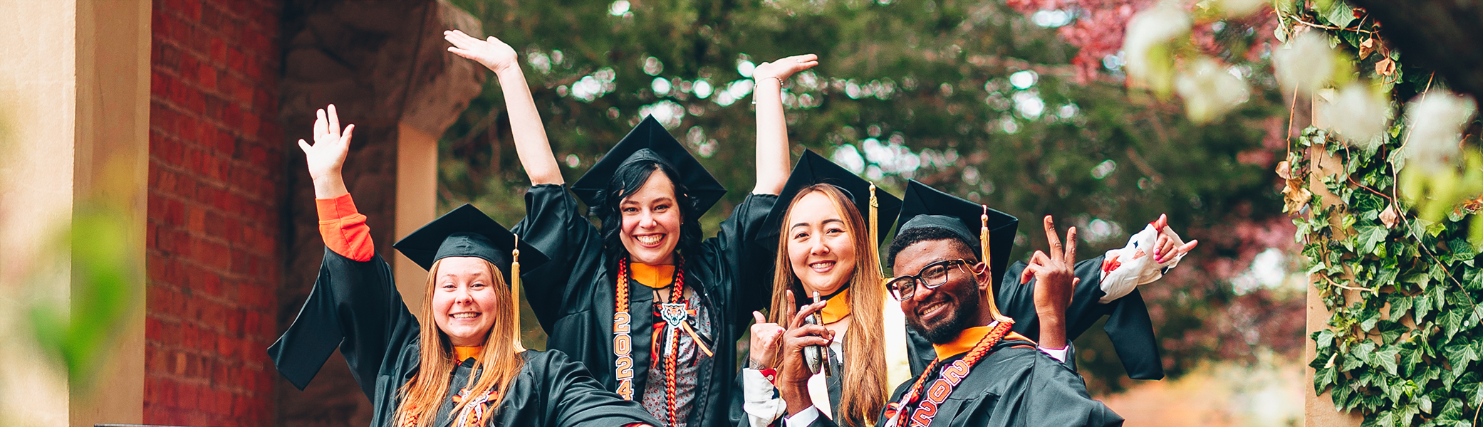 A group of students in graduation regalia