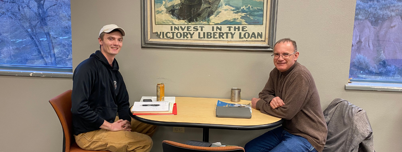 TRIO Veteran's tutor sitting with a student in a tutoring session in the Veterans Student Services Center.
