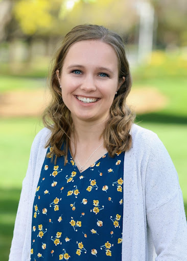 Two students listen to a reading