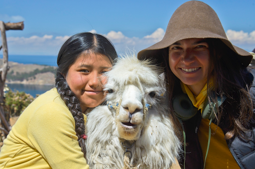 Bolivian filmmaker Catalina Razzini with an alpaca, an important piece of the film