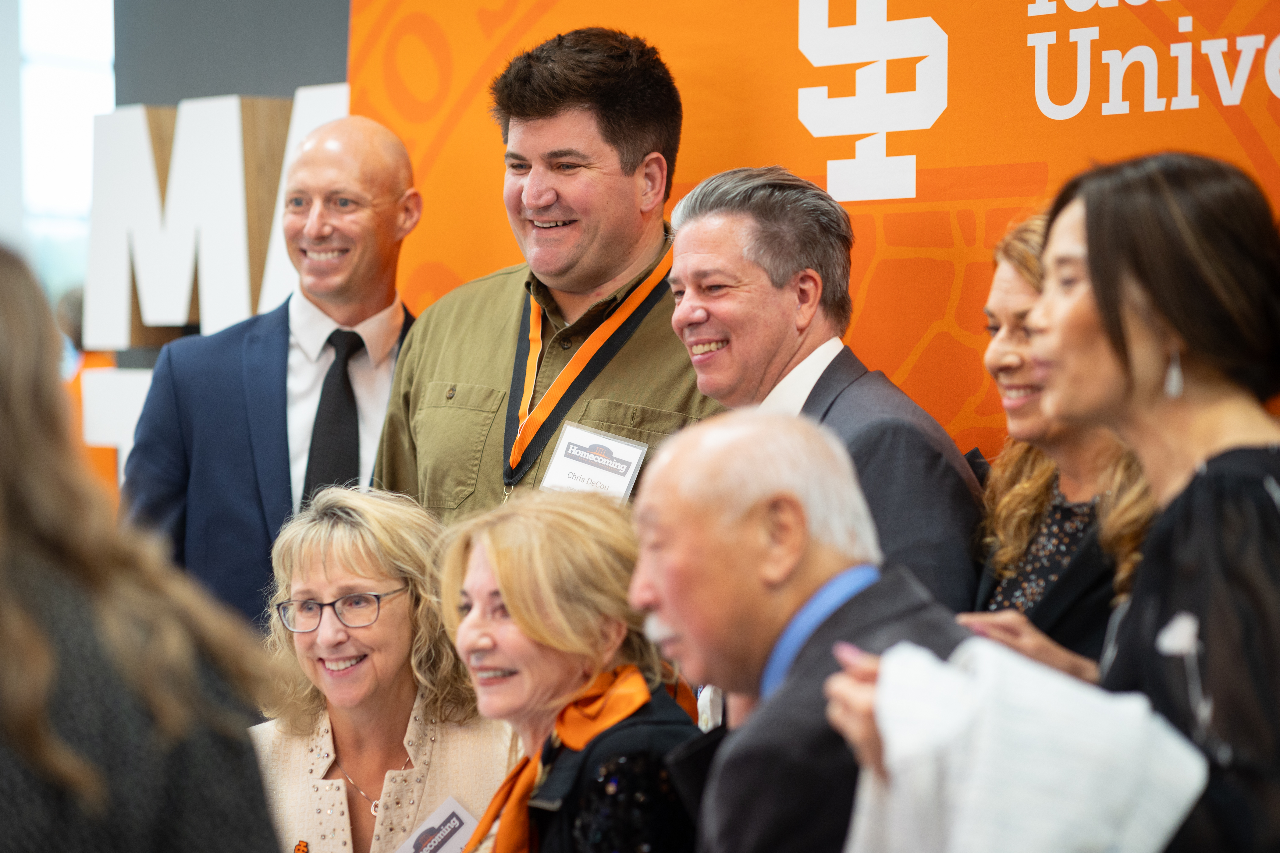 Attendees pose for a photo at the Homecoming Awards Dinner