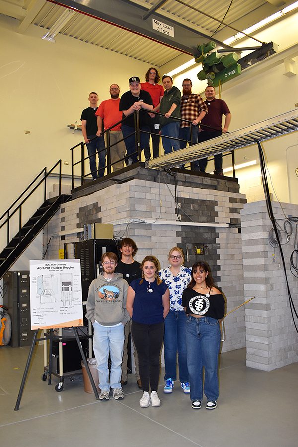 Students gather around the reactor site at ISU