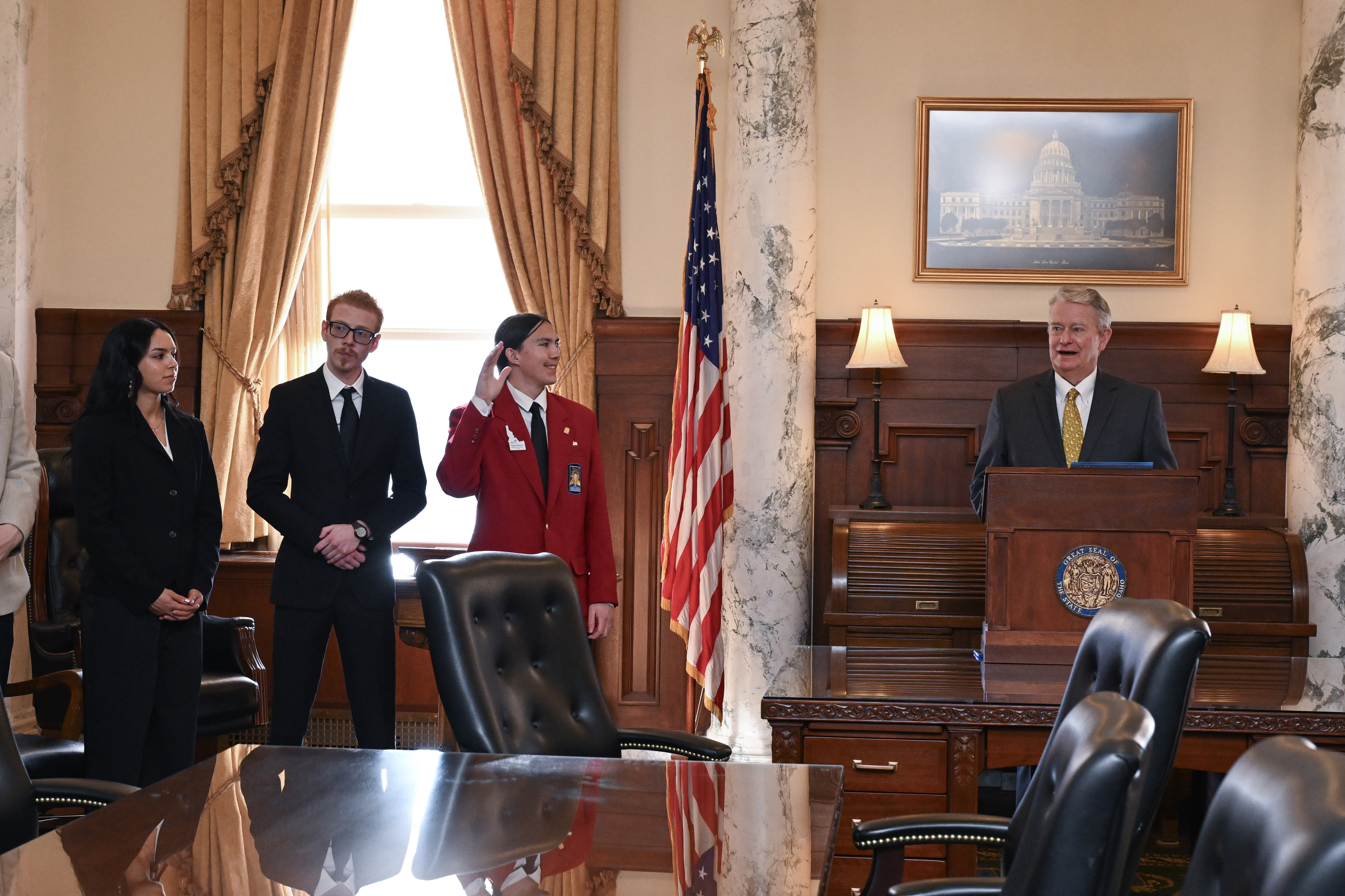 Greysen Malmstrom at a governor's proclamation, featured second from the right