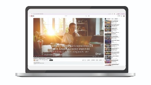 A laptop with youtube open on the screen