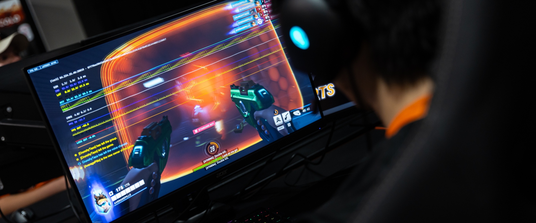 Student playing a first-person shooting game